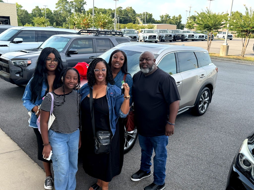 The Bonton family shopping for an INFINITI SUV that fits their lifestyle at INFINITI of Central Arkansas in Benton, AR